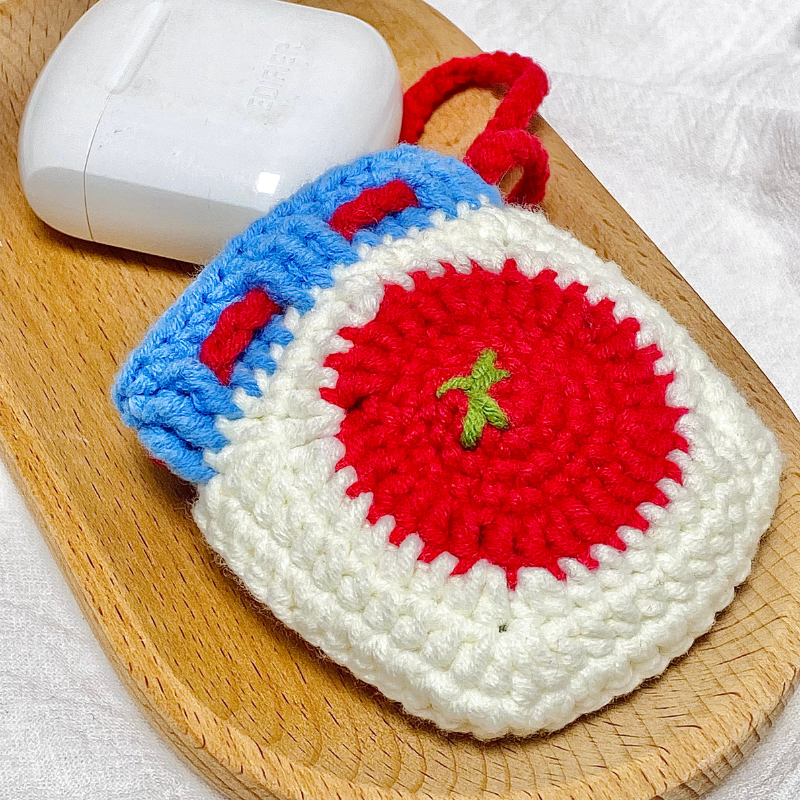 Crocheted red tomato Bluetooth earphone bag